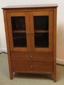 A late Victorian satin walnut dressing chest with mirrored super structure over three drawers on