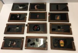 A collection of 23 various Victorian animated magic lantern slides including ten by James Eltoft of
