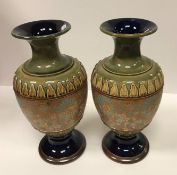 A pair of Royal Doulton Doulter & Slater lace pattern stoneware vases, stamped and No'd.