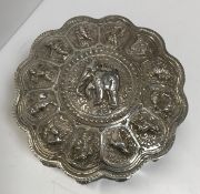 A Burmese silver twelve-sided lidded box with all-over embossed decoration of signs of the Zodiac,