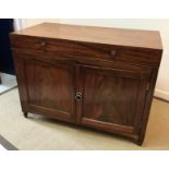 A mahogany side cabinet in the Regency taste,