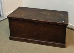 A 19th Century elm trunk of plain form on a plinth base, 107.5 cm wide x 52.