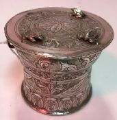 A Tibetan silver or white metal miniature frog or rain drum (one frog missing), 171 g, 9.