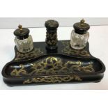 A Victorian ebonised and brass bound desk stand with bottles 33 cm wide x 14 cm high