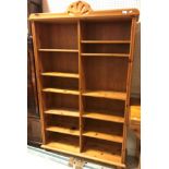 A modern pine open bookcase of two banks of adjustable shelving 116 cm wide x 30 cm deep x 187 cm