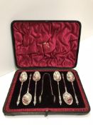 A set of six Victorian apostle spoons with sugar tongs (by Mappin & Webb, Sheffield 1897),