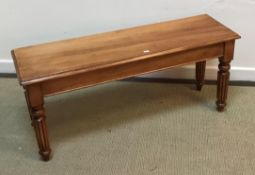 A good quality modern cherry wood window seat in the Victorian style,