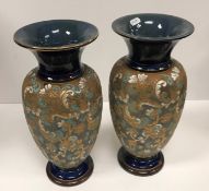 A pair of Doulton Lambeth Doulton & Slaters lace pattern vases, bearing impressed No.