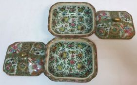 A pair of 19th Century Chinese famille rose tureens and covers of small proportions each decorated