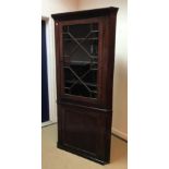 A 19th Century mahogany free standing corner cupboard,