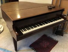 An early to mid 20th Century mahogany cased boudoir grand piano,