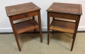 A pair of mahogany and inlaid Sheraton style bedside tables with single drawers,