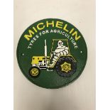 A modern painted cast iron sign inscribed "Michelin Tyres for Agriculture",