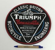 A modern painted cast metal sign "Triumph Bonneville .....