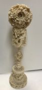 A large late 19th / early 20th Century Chinese carved ivory puzzle ball on a phoenix and foliate