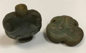 Two Chinese carved jade scent bottles of foliate design, 5 cm x 4.2 cm and 4.2 cm x 4.