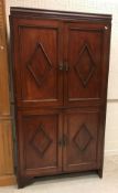 A late Victorian mahogany cupboard,