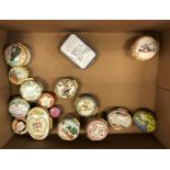 A collection of sixteen various Halcyon Days pill boxes and a Royal Worcester pill box,