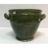 A late Victorian green glazed Ewenny Pottery two handled jardiniere/pot inscribed "Cymru Dros Byth"