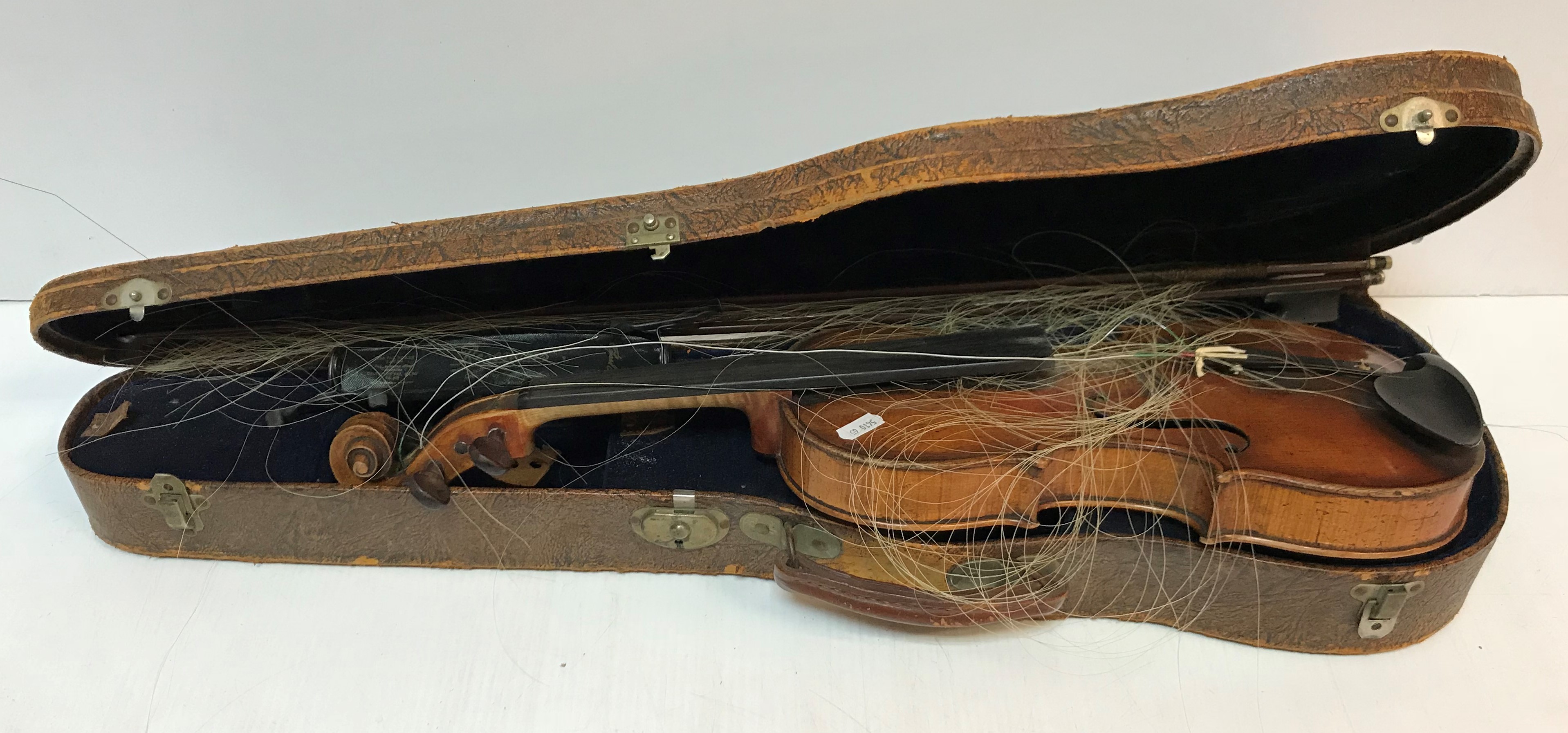 A late 19th Century Continental violin bearing "Guanarius" label dated 1697 (fake label) together - Image 2 of 37