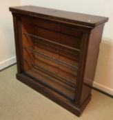 A mahogany open bookcase,