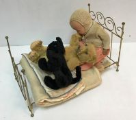 A vintage Farnells alpha toy gold plush bear with jointed arms and legs and hump back,