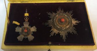 A Chinese Order of the Double Dragon medallion and breast star