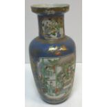 A 19th Century Chinese powder blue ground gilt decorated vase painted with panels of figures in a
