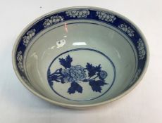 A Chinese blue and white chrysanthemum decorated bowl 28 cm in diameter x 10.
