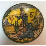 A 19th Century Italian majolica dish, the centre decorated with a lady carrying three pails,