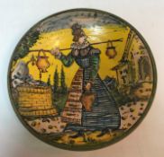 A 19th Century Italian majolica dish, the centre decorated with a lady carrying three pails,