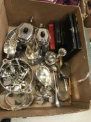 A collection of plated wares to include a dish stand, bottle coaster, various flat ware,