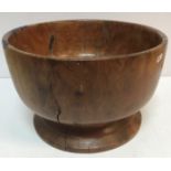 A large turned yew wood pedestal fruit bowl turned of a single piece 38.5 cm diameter x 24.