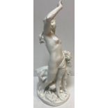A late 19th Century blanc de chine figure of "Nude with a goat", 53.