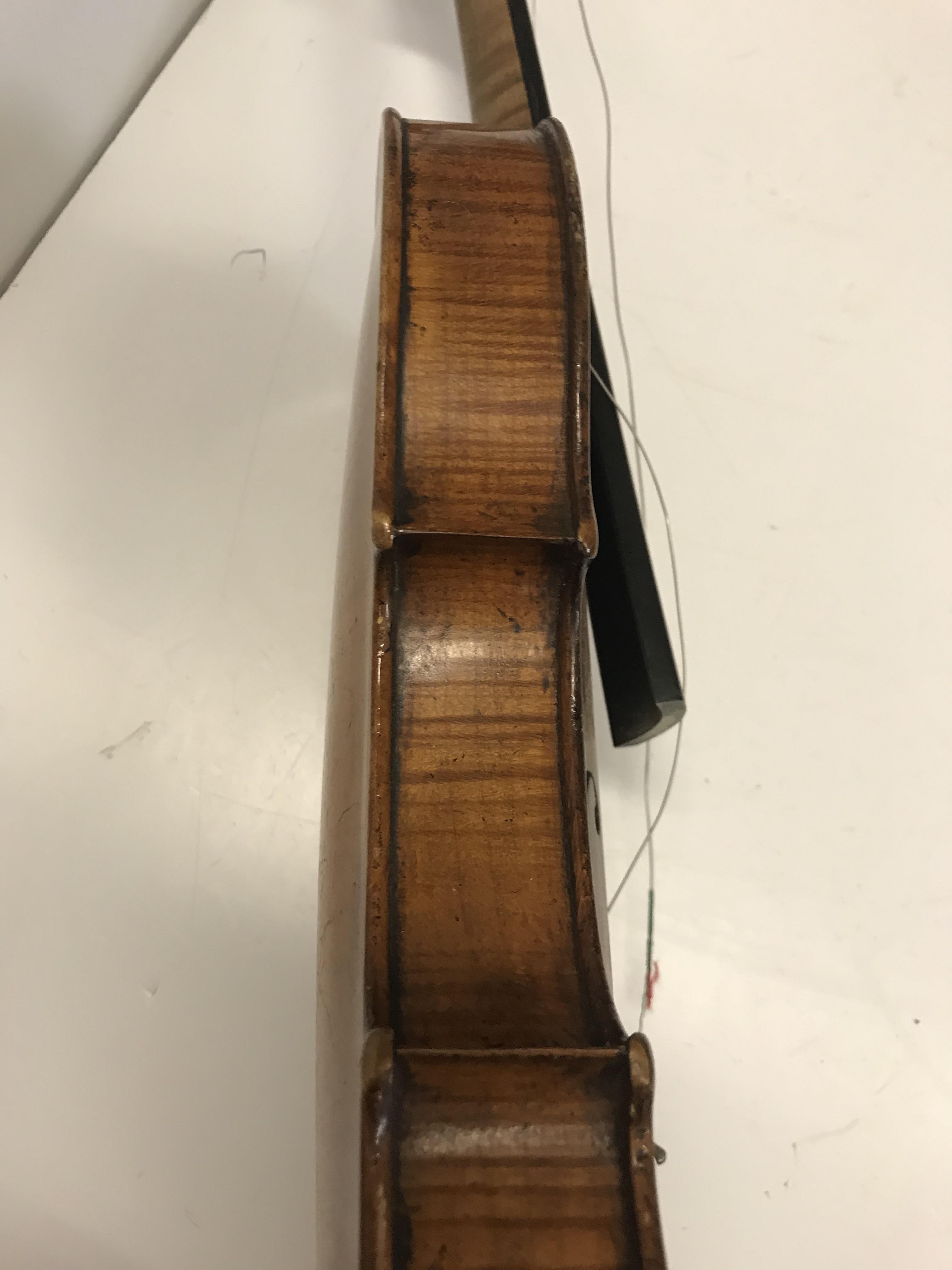 A late 19th Century Continental violin bearing "Guanarius" label dated 1697 (fake label) together - Image 16 of 37