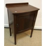 An early to mid 20th Century walnut bow fronted bedroom chest in the Georgian style,