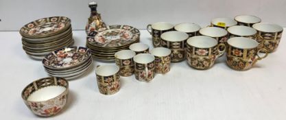 A collection of Royal Crown Derby Japan pattern tea and coffee wares to include seven side plates,