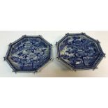 A pair of Japanese blue and white octagonal shallow dishes set with foliate and bird decoration