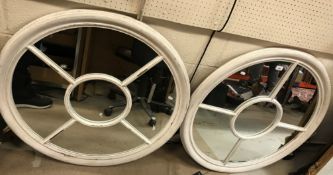 A pair of Pomax wooden framed round mirrors with distressed paint effect 90 cm in diameter