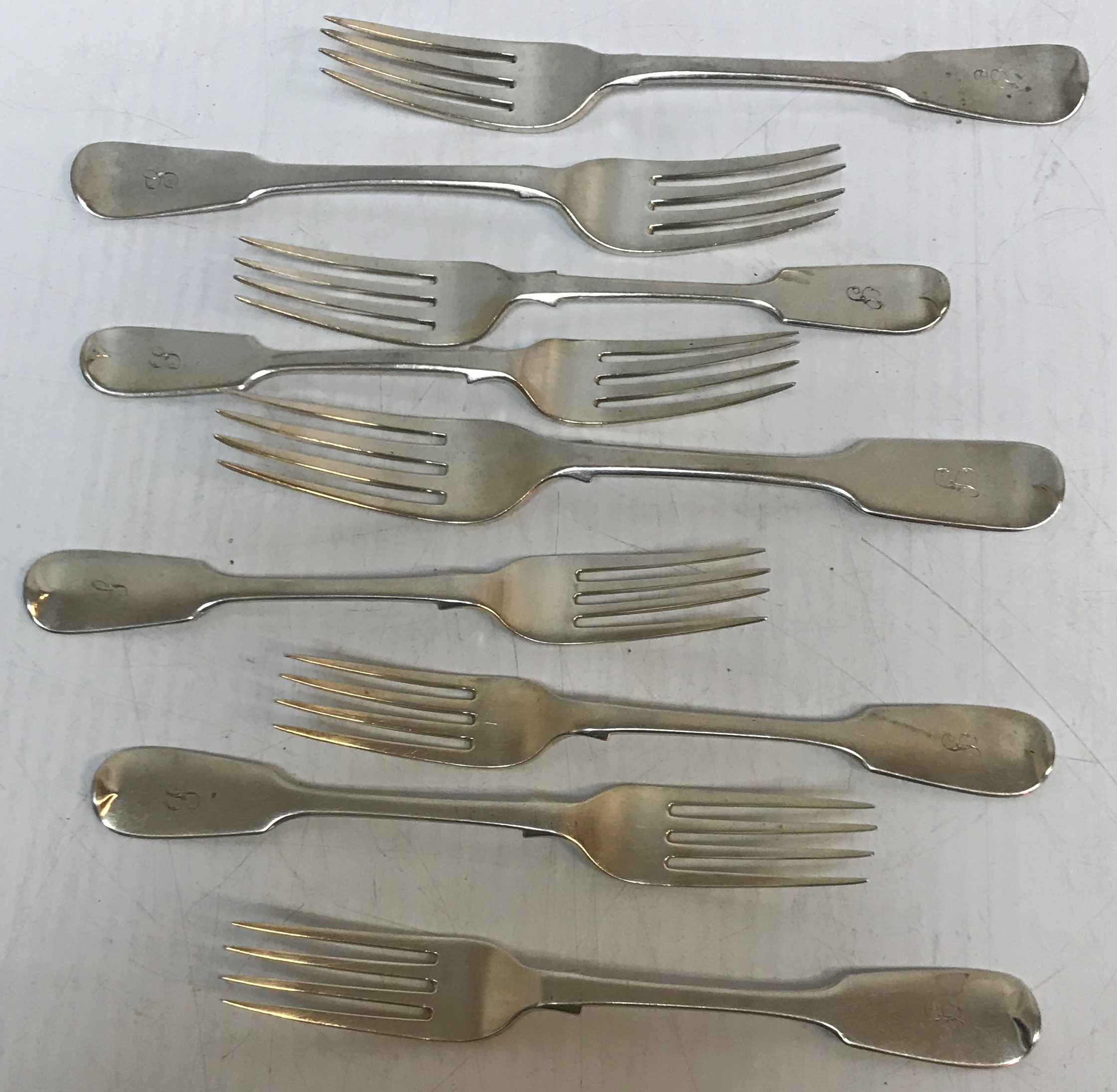 A collection of six Victorian "Fiddle" pattern silver dessert forks (four London, 1833 by George W.
