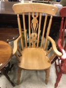 Three various 20th Century Windsor slat / stick back kitchen elbow chairs
