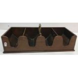 A late George III mahogany four bottle wine carrier of rectangular form with central brass handle