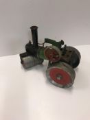 A collection of toys to include a Mamod traction engine steam roller,