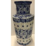 An Oriental blue and white vase of lobed form with floral decoration, 48.