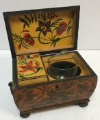 A 19th Century painted satinwood single section tea caddy of bombé form,
