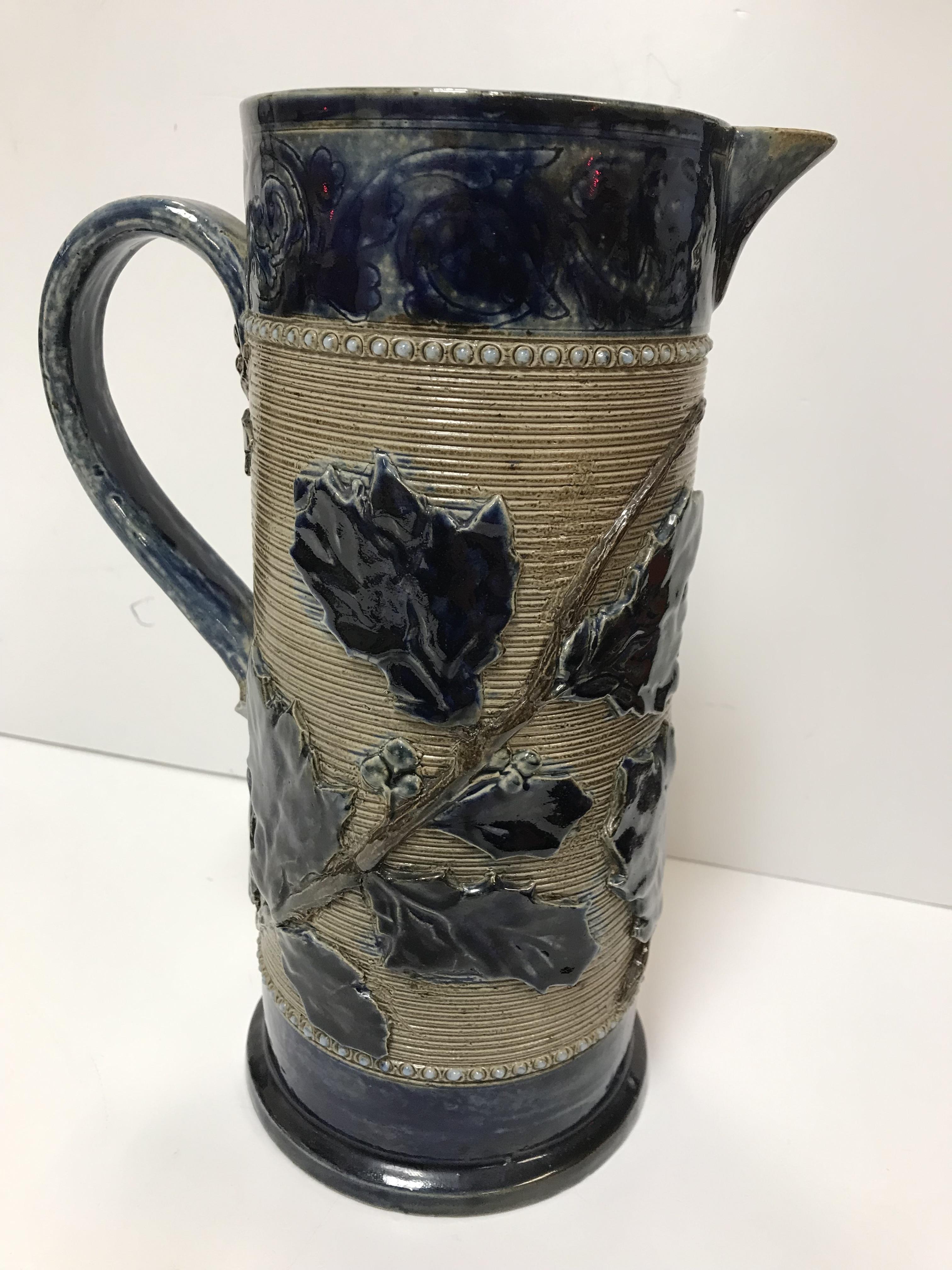 A Victorian glazed stoneware jug with holly decoration, - Image 4 of 27