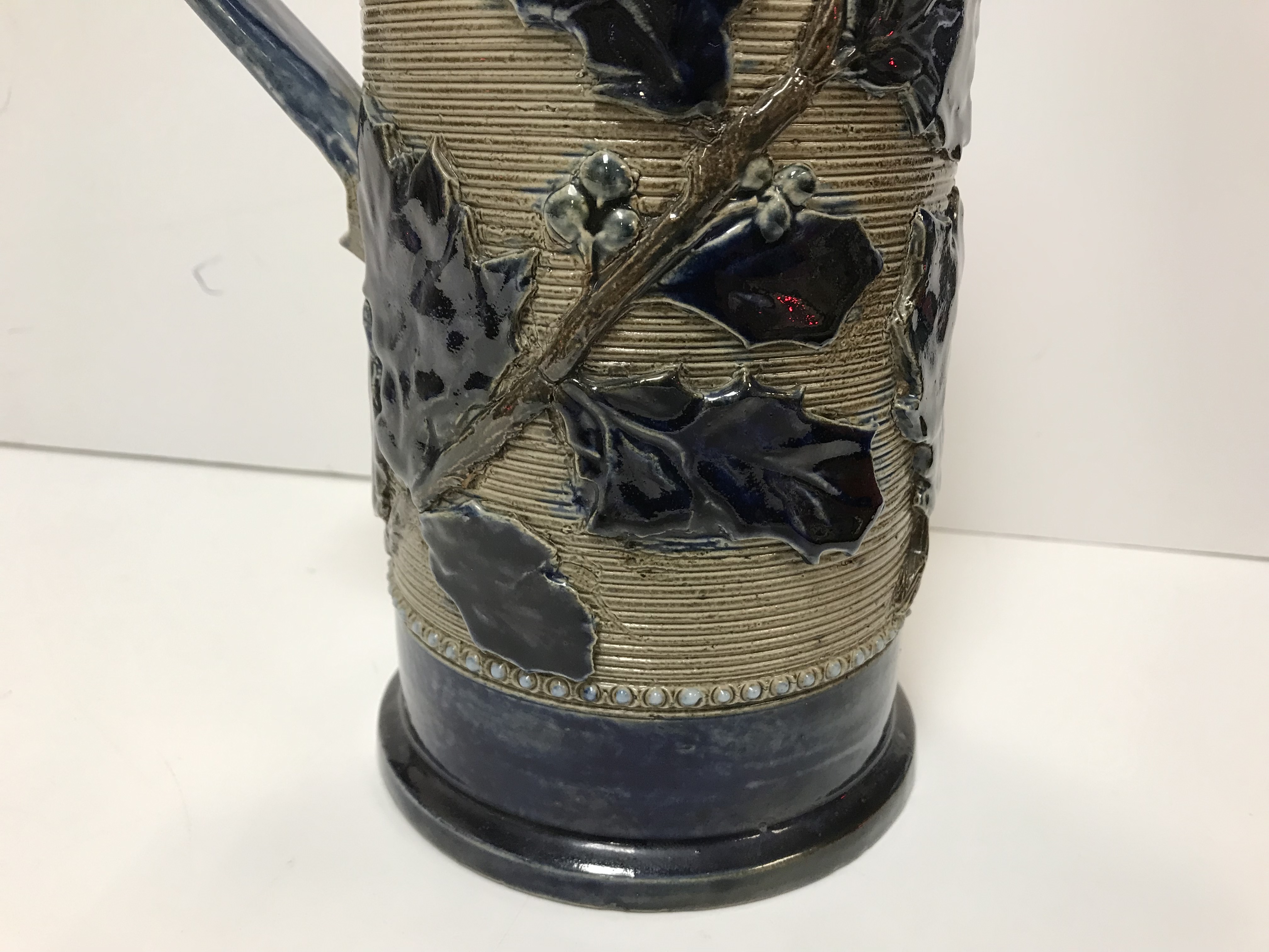 A Victorian glazed stoneware jug with holly decoration, - Image 6 of 27