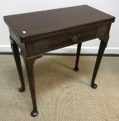 A circa 1900 mahogany fold-over tea table in the 18th Century manner,