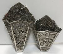 A 19th Century silver and pierced betel leaf holder of pierced scrolling foliate decoration with