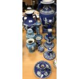 A collection of Wedgwood blue Jasperware including classical style vase on pedestal base to square